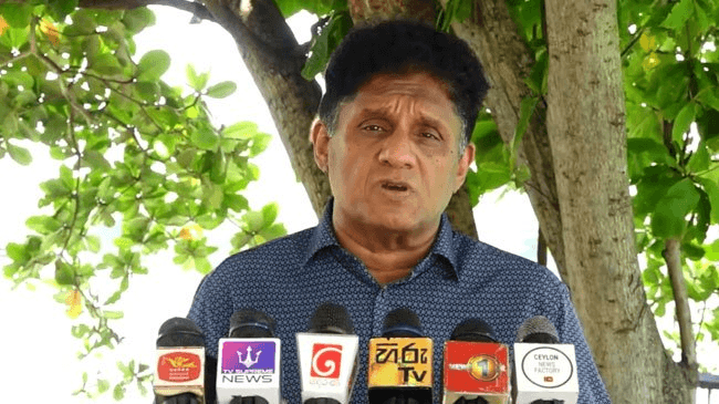 கடனுக்காகக் கையேந்தாதே , தேசிய நலன்புரித் திட்டங்களை உடனே தொடங்கு !